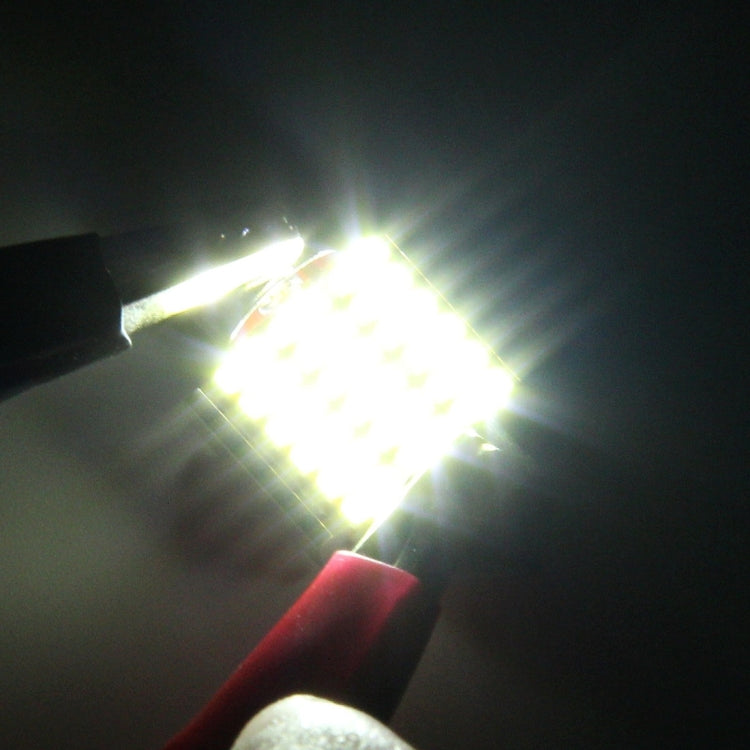 Bright white LED beam from a 31mm car door dome lamp for interior light