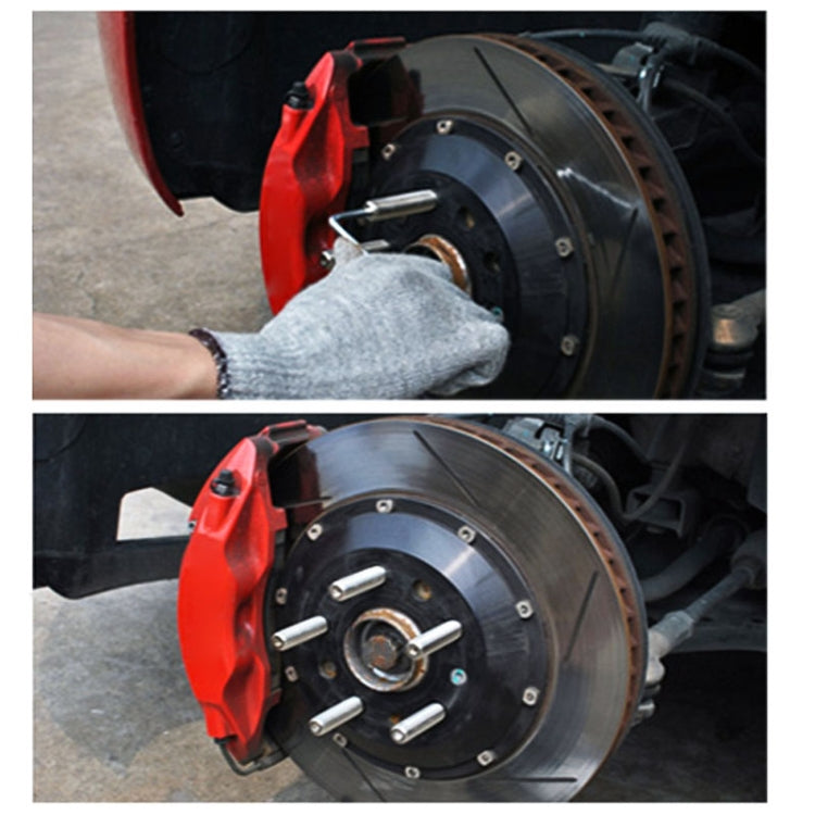 Wheel stud conversion adapters on vehicle brake rotor, silver threaded studs installed