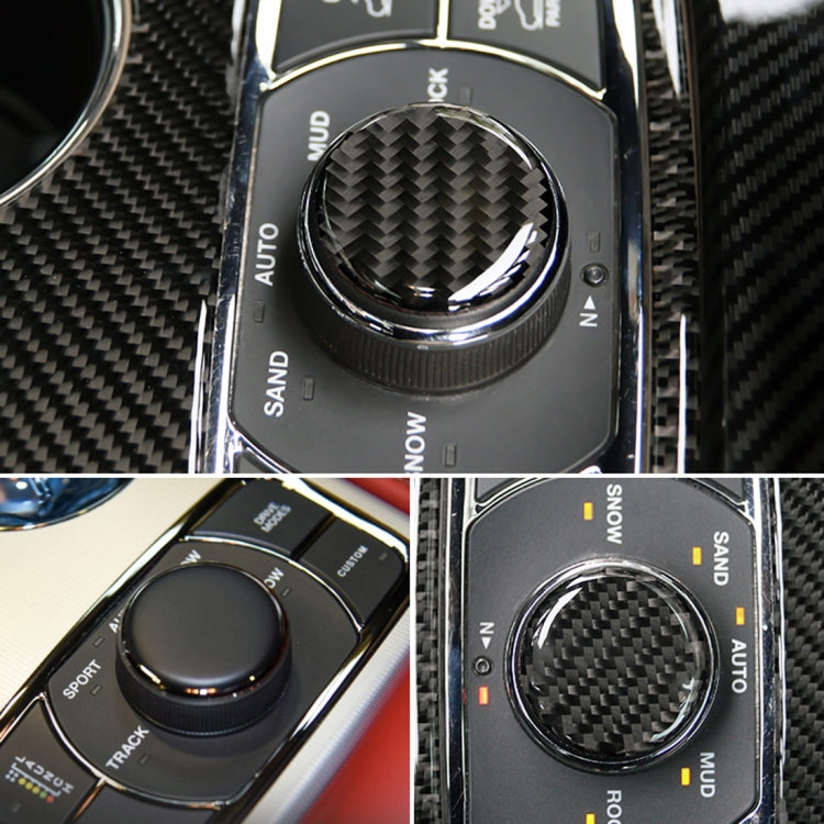 Round carbon fiber-look rotate button sticker on car center control panel