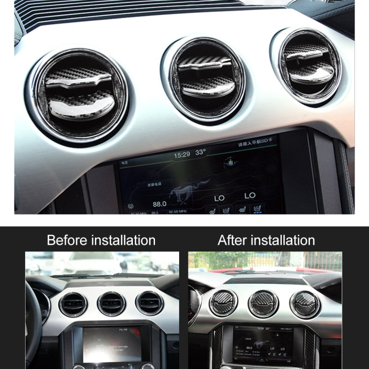 Central air vent trim rings installed on dashboard, carbon fiber style with chrome trim