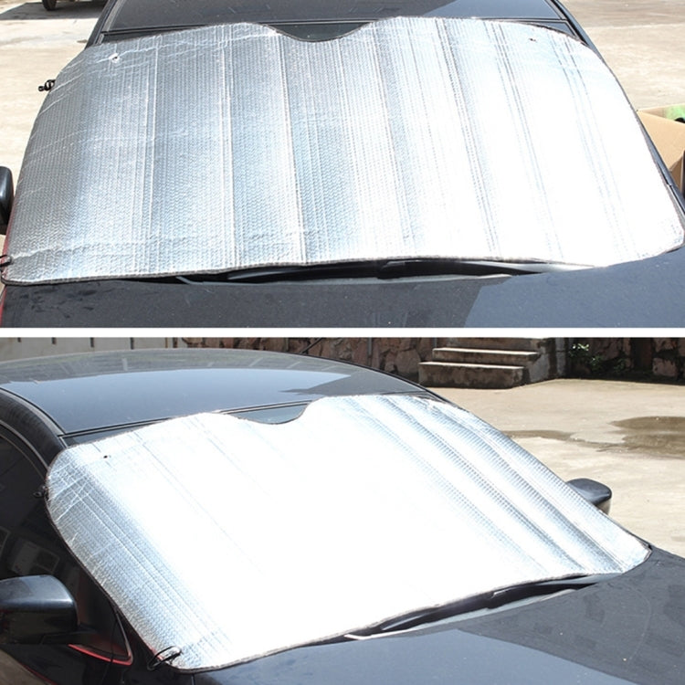 Silver aluminum foil car windshield sun shade on front window, two views