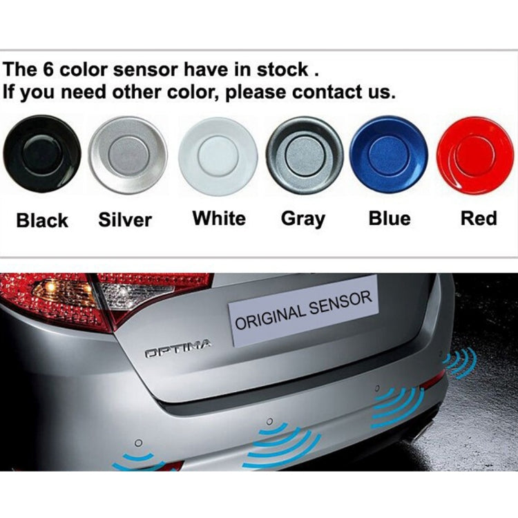 Parking sensors in multiple colors (black to red) with rear bumper detection waves