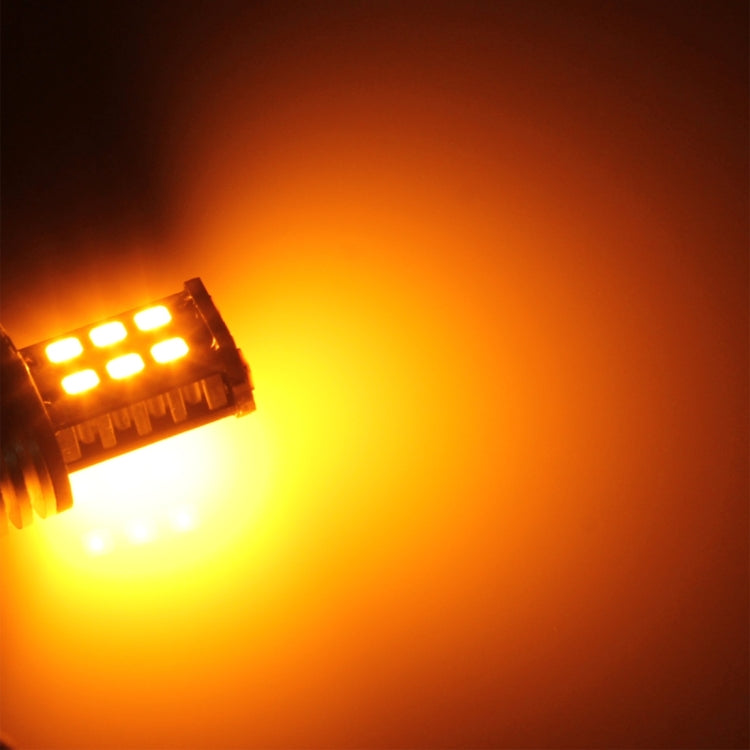 Amber-lit 1157/BAY15D LED turn light bulb tips with SMD array on silver base