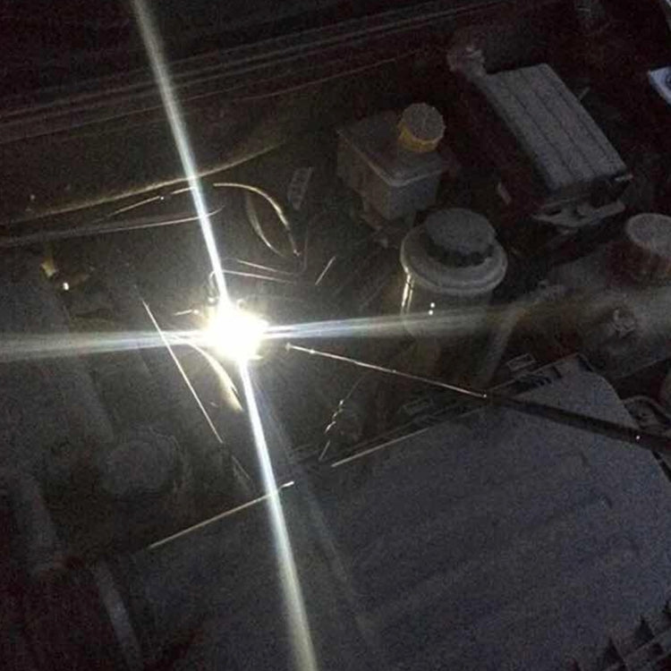 Retractable undercar inspection mirror with bright LED lights, mounted on a vehicle