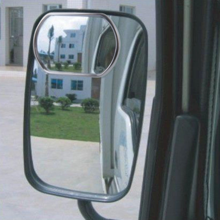 Truck side blind spot mirror with chrome frame, mounted on door
