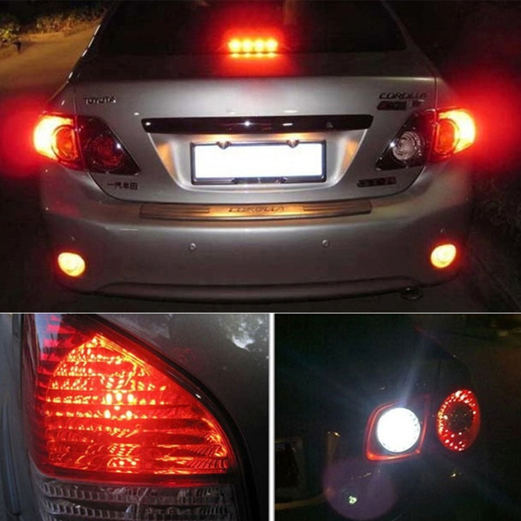 LED brake and turn light bulbs installed on vehicle, red tail lights illuminated