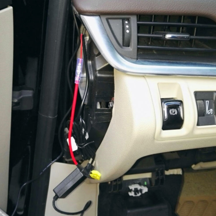 Add-a-circuit fuse tap adapter cable connected near car dashboard