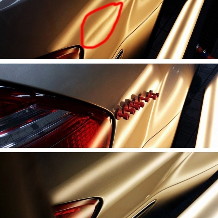 Paintless dent repair glue tabs kit in use to pull a dent from a car panel