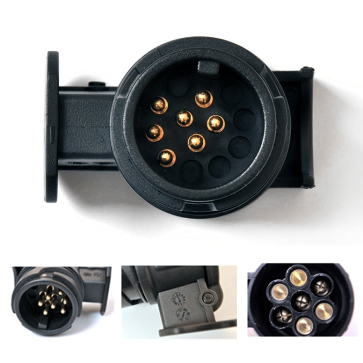7-pin connector socket adapter, top view of black round housing with 7 gold contacts