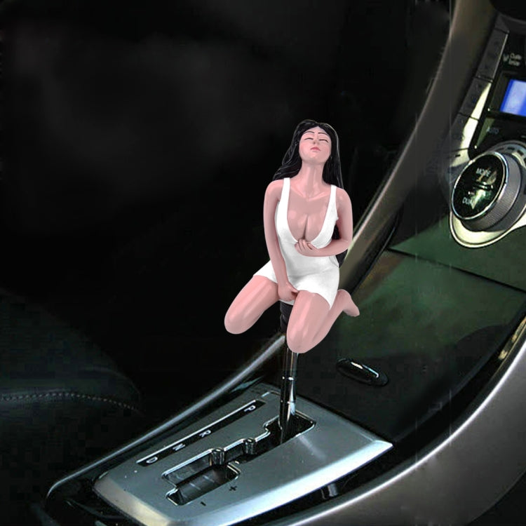 Car shift knob topper with brunette woman figure in white outfit on gear area