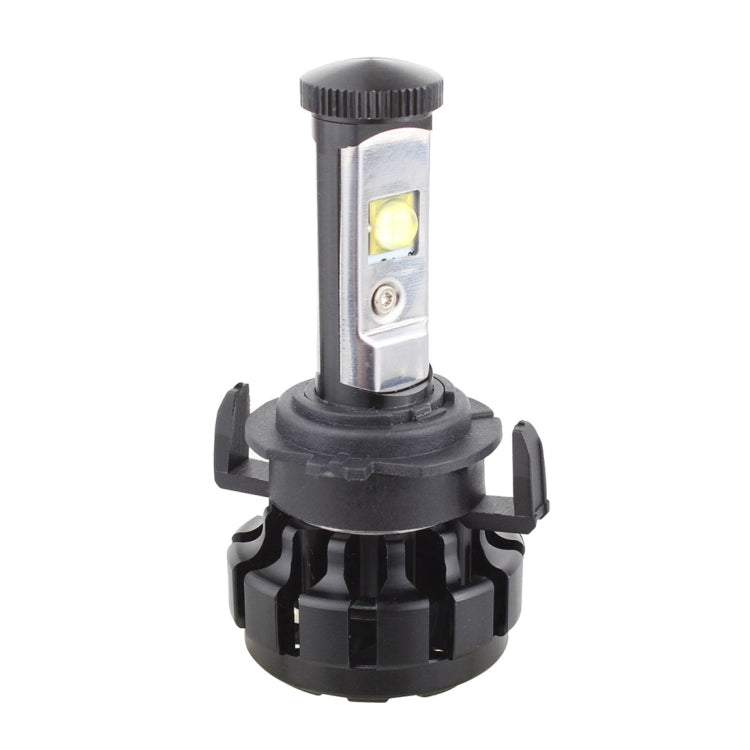 H7 LED headlight bulb with black retainer adapter and visible LED chip