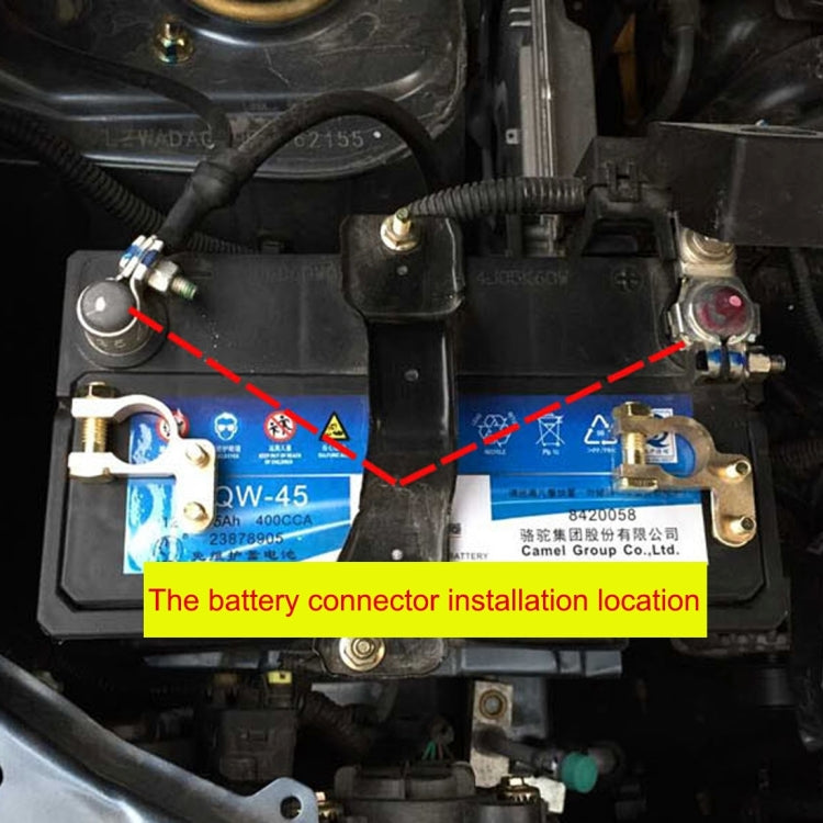 Brass battery terminal clamps installed at car battery posts, positive and negative