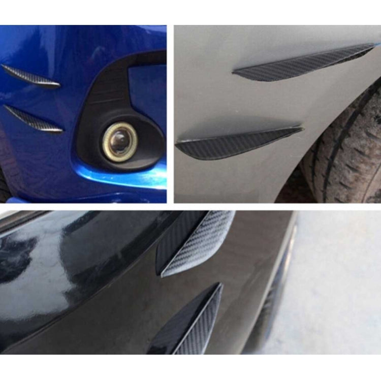 Carbon fiber style front bumper lip splitter protectors, black blades installed on bumper