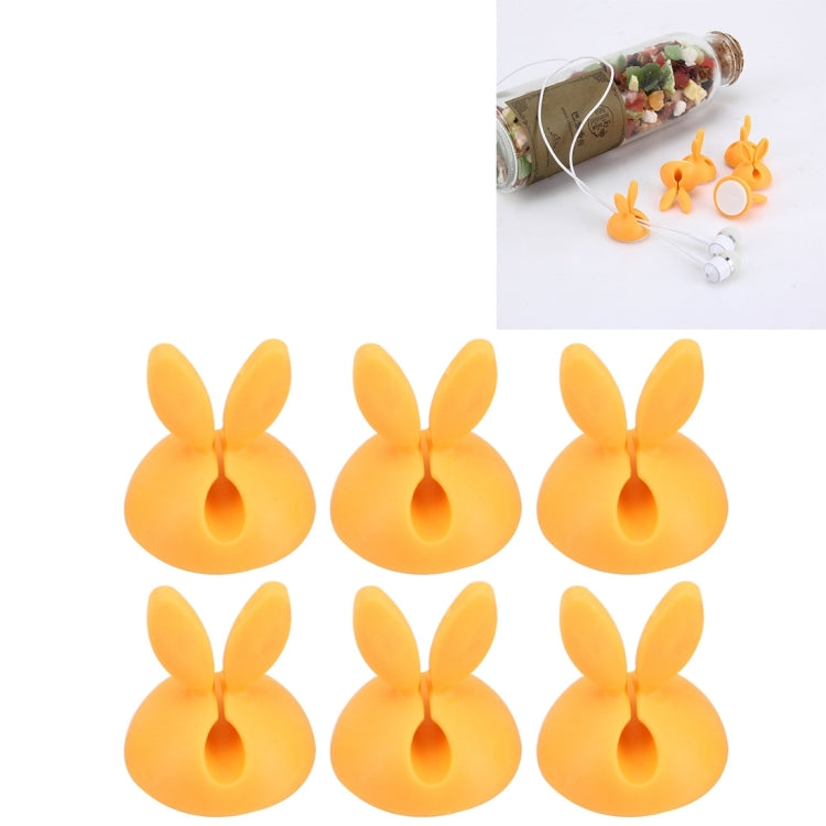 Yellow rabbit-shaped single-hole cable clips, six-pack for tidy cord management.