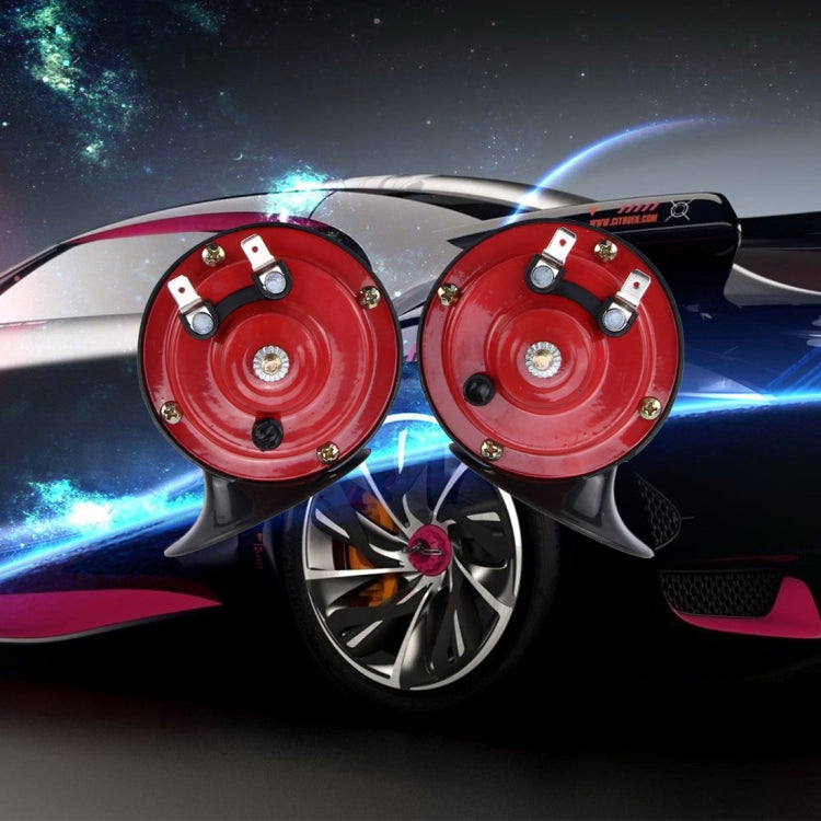 Mounted red and black twin air horns with brackets on vehicle