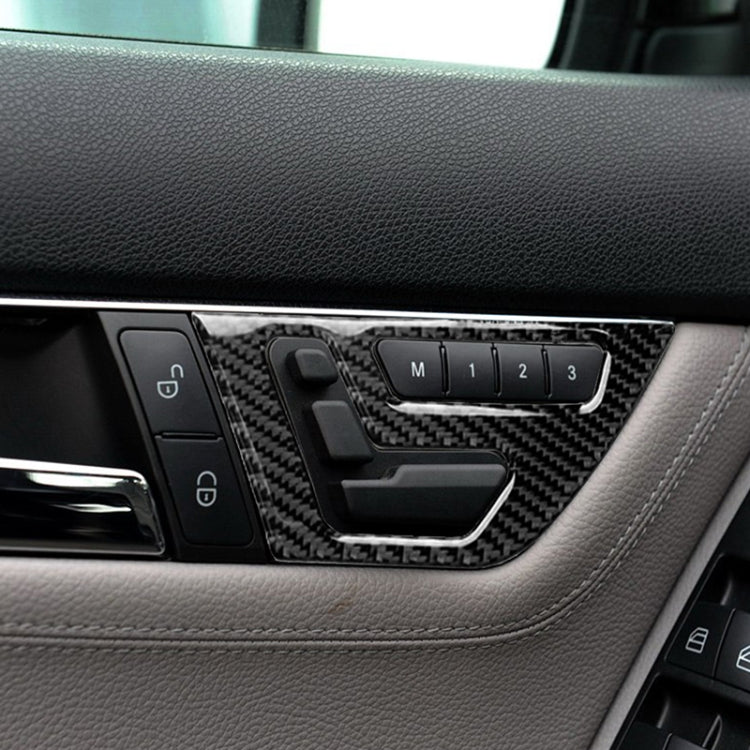 Installed black carbon fiber seat adjustment sticker on dashboard control area