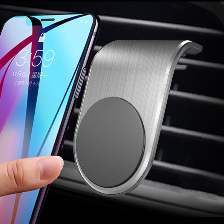 Air outlet magnetic phone holder with silver-gray frame and dark gray circular magnet pad
