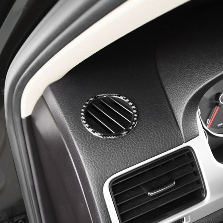 Dashboard air vent ring sticker in black carbon-fiber trim, round opening detail