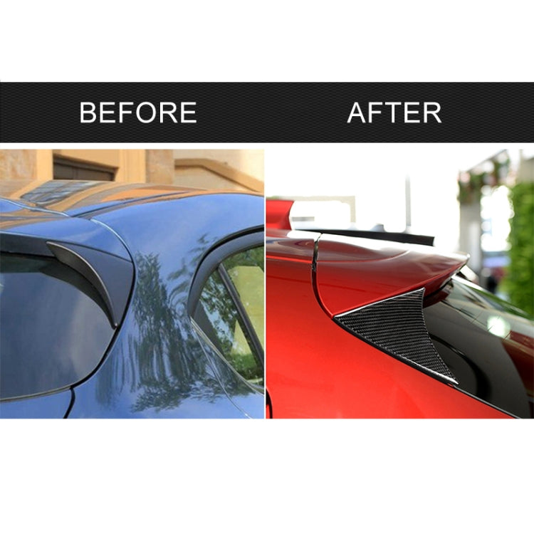 Carbon fiber rear wing side spoiler lip installed on hatchback, pair of black fins