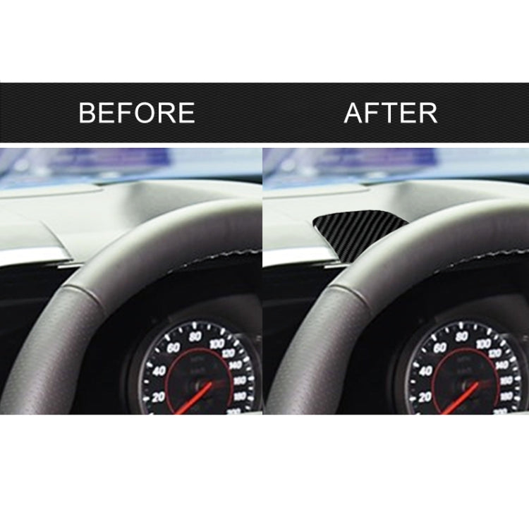 Dashboard center trim after installation: black carbon fiber insert