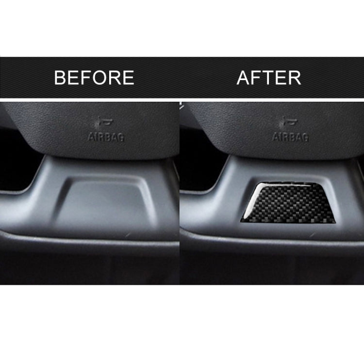 Black carbon fiber steering wheel lower trim decal installed in lower panel