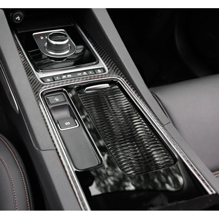 Carbon-fiber look trim sticker frame installed on car center console