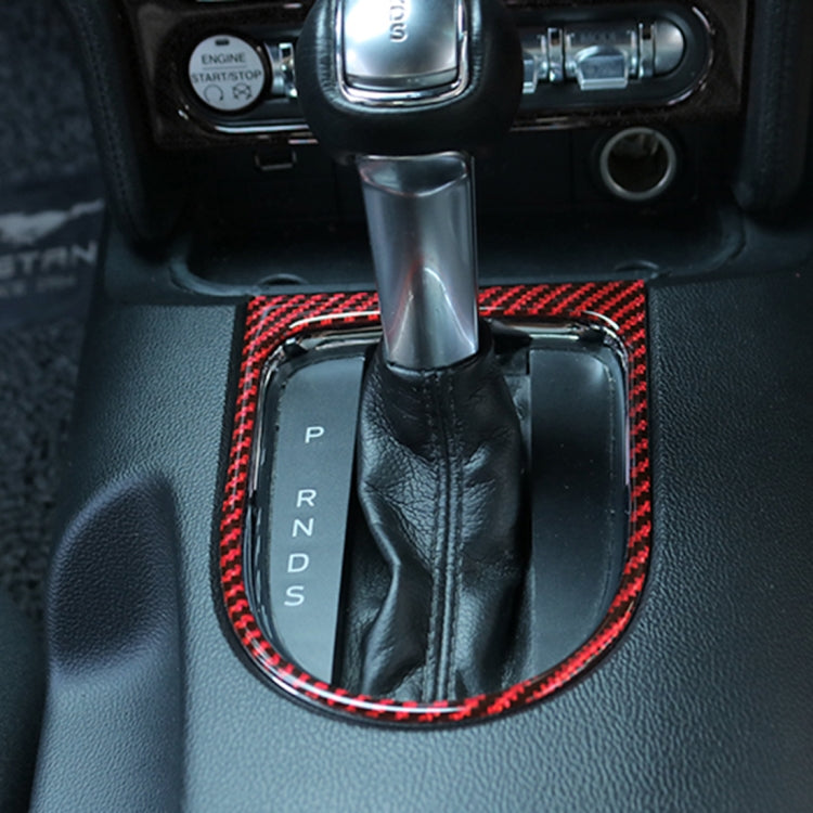 Installed red-black carbon-fiber gear frame around automatic shifter with red stitching