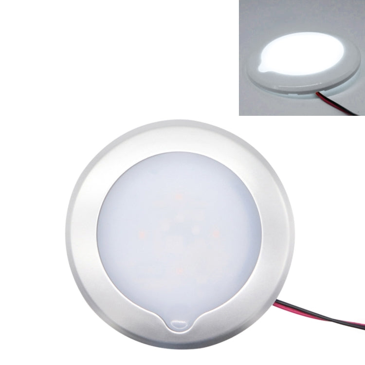 White round LED dome ceiling light with glowing center and attached red/black wires