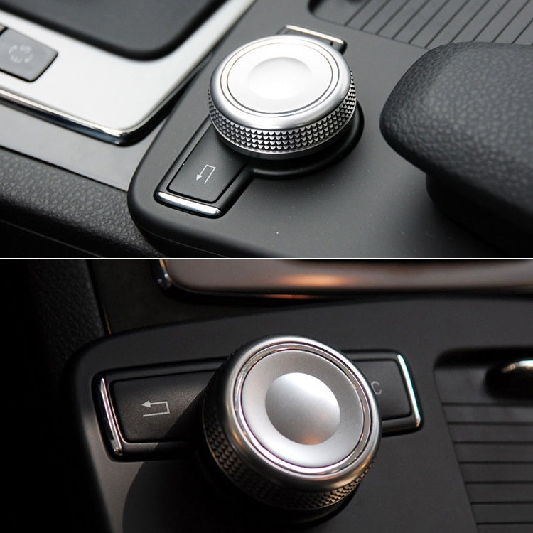 Car center console control knob with textured grip and silver circular face