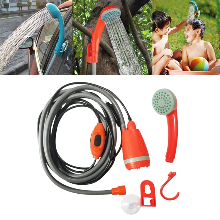 Orange 12V car washer shower sprinkler kit with gray hose, pump, and spray attachments
