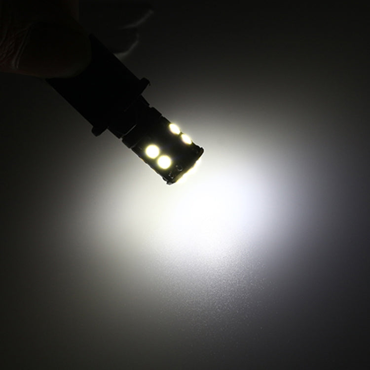 T10 LED car decoding bulb glowing bright white, compact black housing