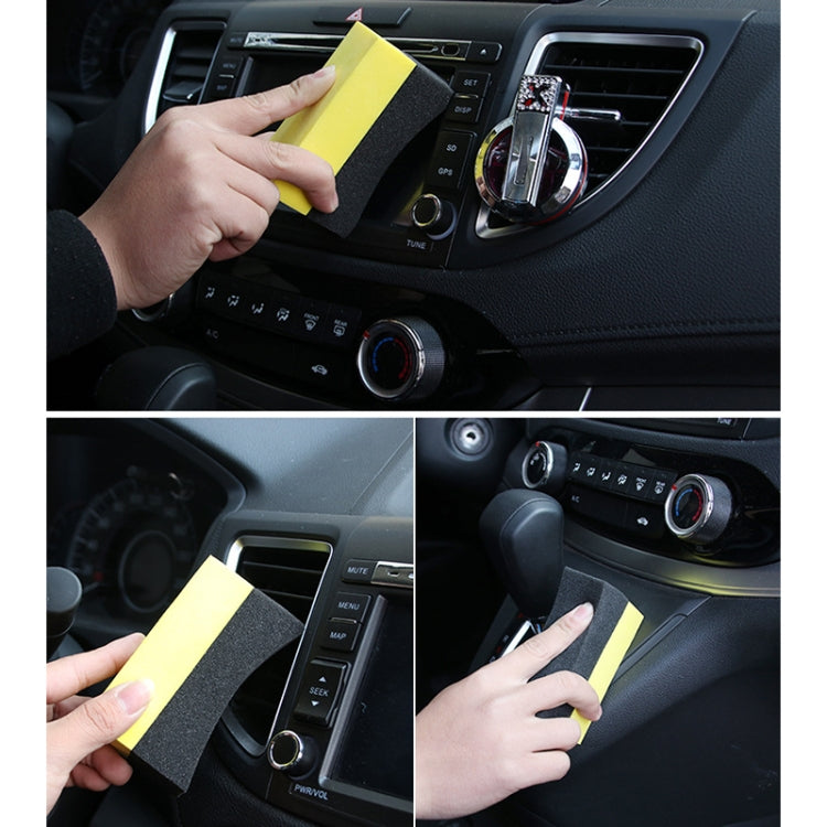 Hands using black-and-yellow EVA corner sponges on car dashboard controls