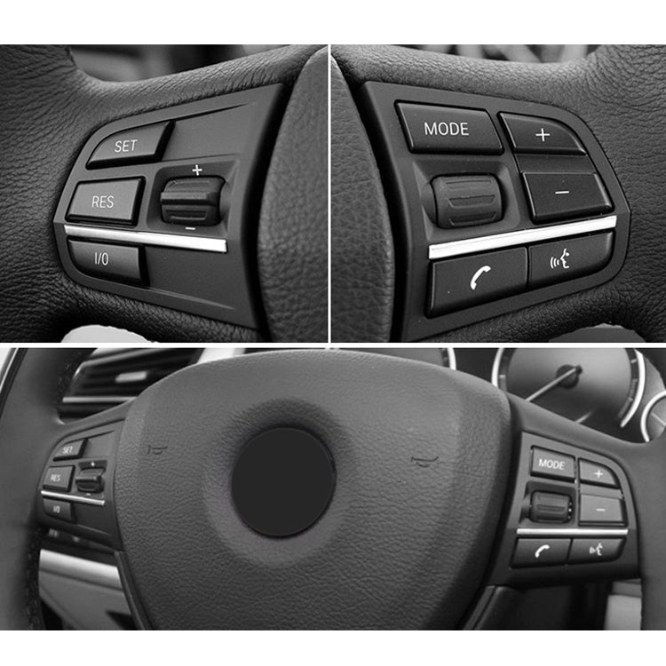 Steering wheel switch panel showing multi-function buttons
