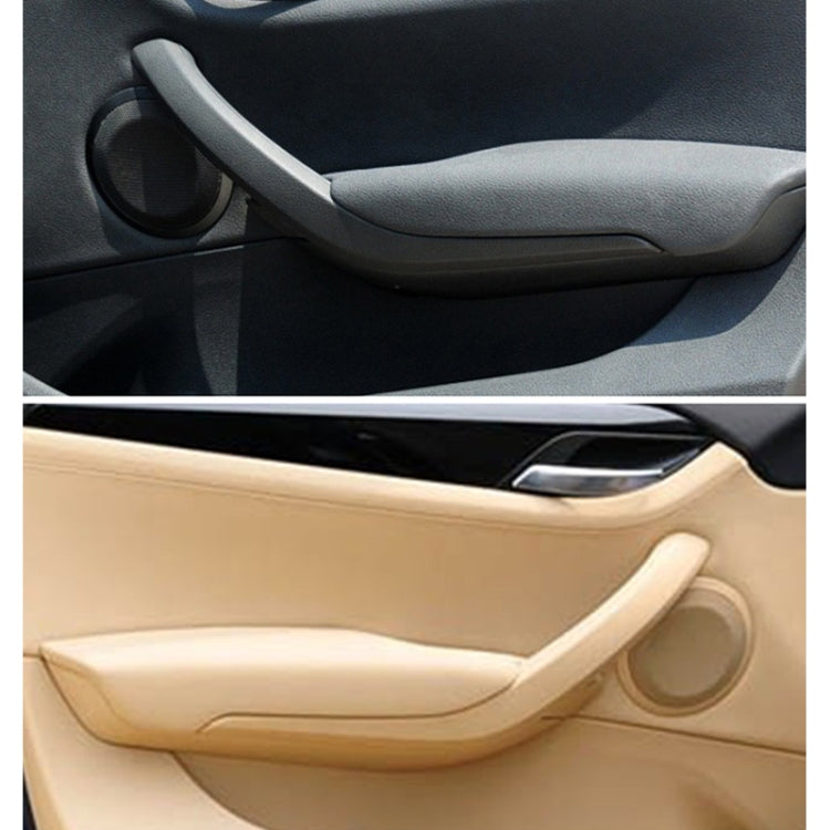 Interior door handle pull trim shown in black and beige