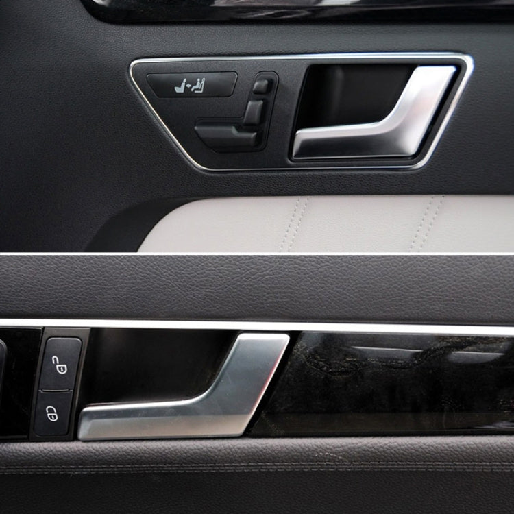 Matte inner door handle, silver-gray, installed on car door panel