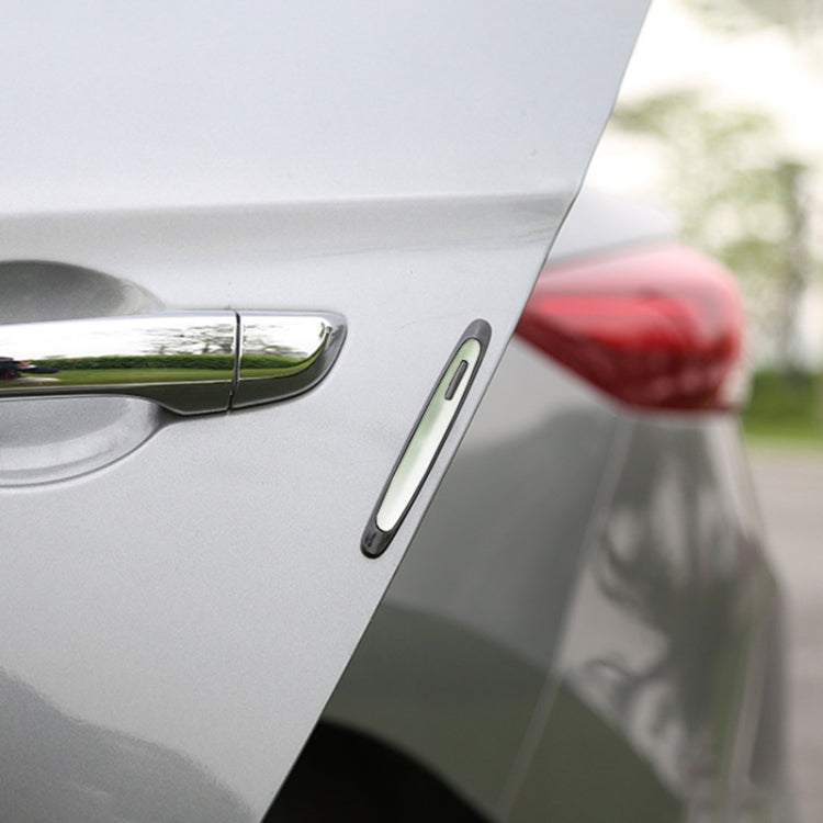 Car door with one anti-collision strip sticker near the door handle area