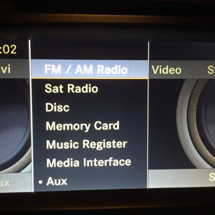Car infotainment menu screen with FM/AM radio and media options
