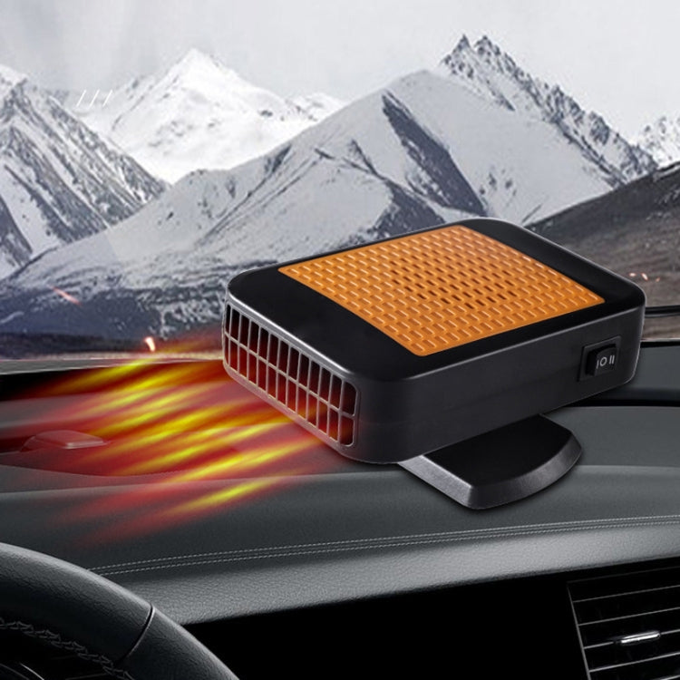 Car windshield defroster heater with orange top on dashboard with airflow rays