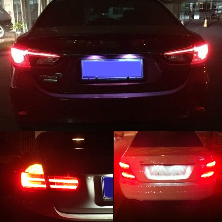 LED car brake light with red illumination along rear tail light strip