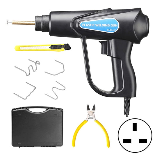 Black plastic welding gun with UK plug and assorted repair staples and clips
