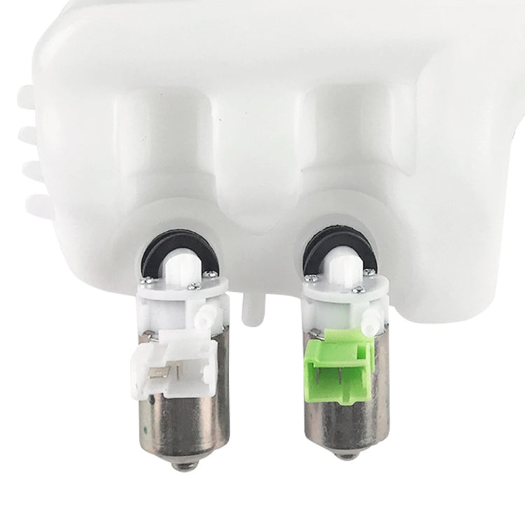 Two-hole washer fluid tank kit, white housing with two metal nozzles and green electrical plug
