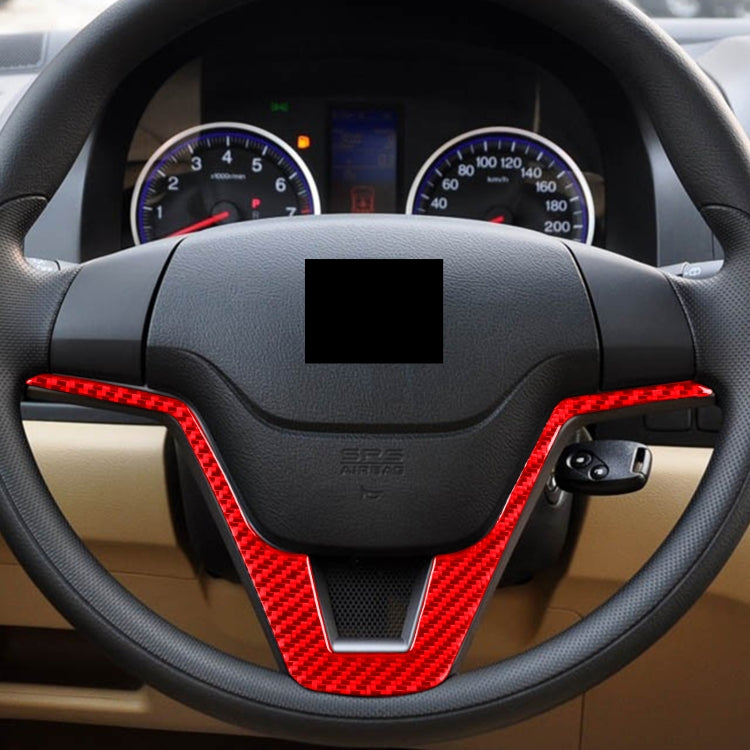 Installed steering wheel V-shaped carbon fiber trim, red accents on spokes