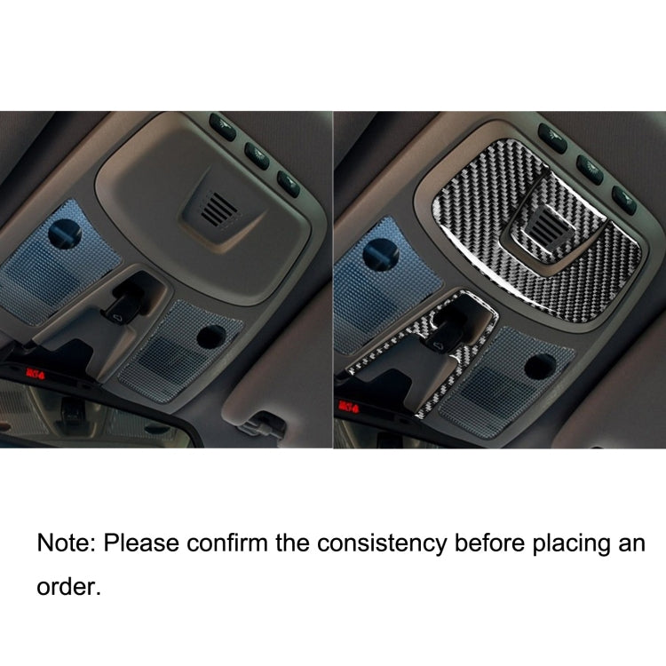 Carbon fiber reading light trim sticker on car console, replacing a plain cover