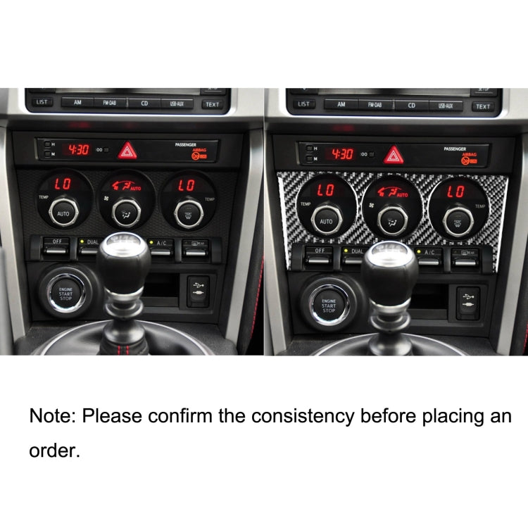 Dashboard center control area with carbon fiber overlay on air conditioning button area
