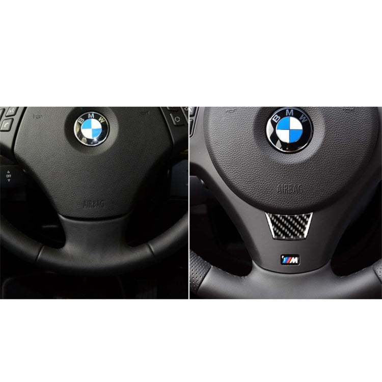 Steering wheel center before and after with carbon-fiber triangular sticker insert