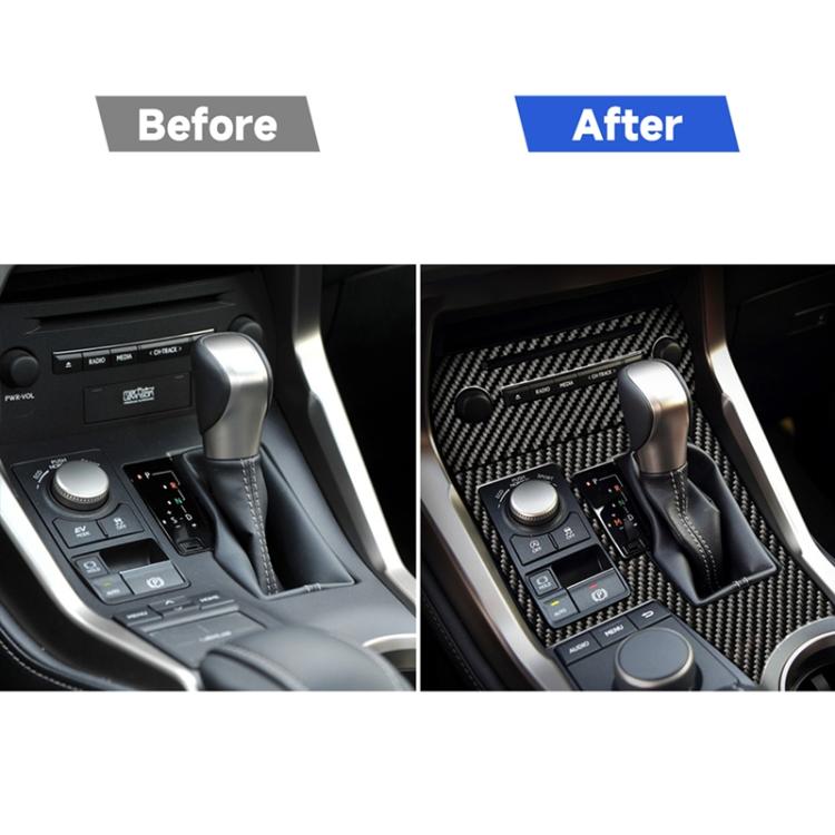 Center console CD panel with carbon fiber trim sticker installed over controls