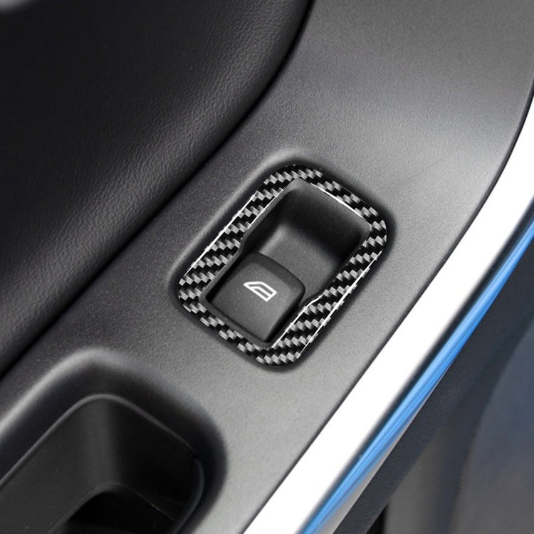 Close-up installed window switch button sticker in carbon fiber pattern trim