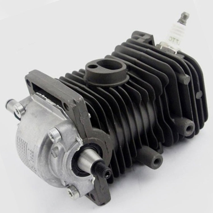 Chainsaw engine cylinder piston assembly close-up, black cooling fins and silver head