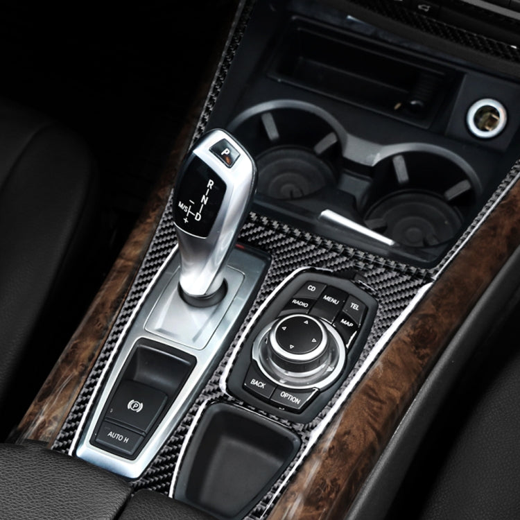 Installed carbon fiber cup holder trim sticker around gear/control area