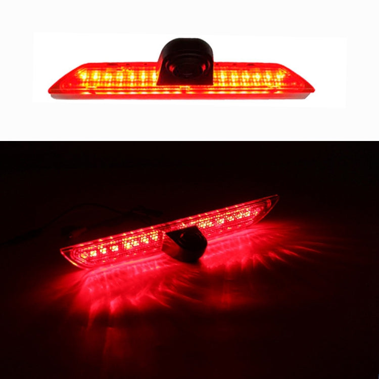 Illuminated high-mount brake light with built-in rear camera, red light